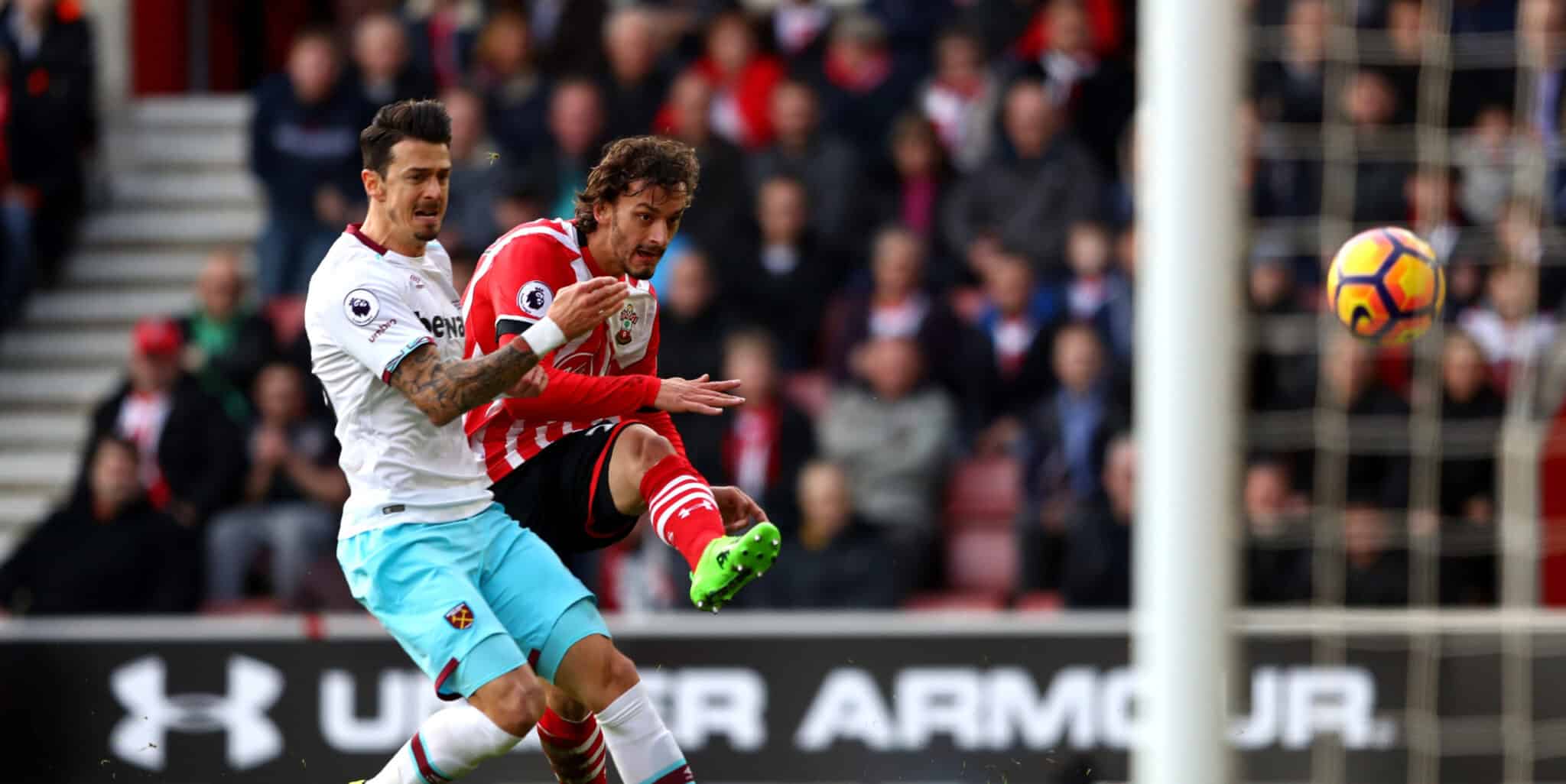 Manolo Gabbiadini and Jose Fonte battle as West Ham played Southampton at St Marys in the Premier League