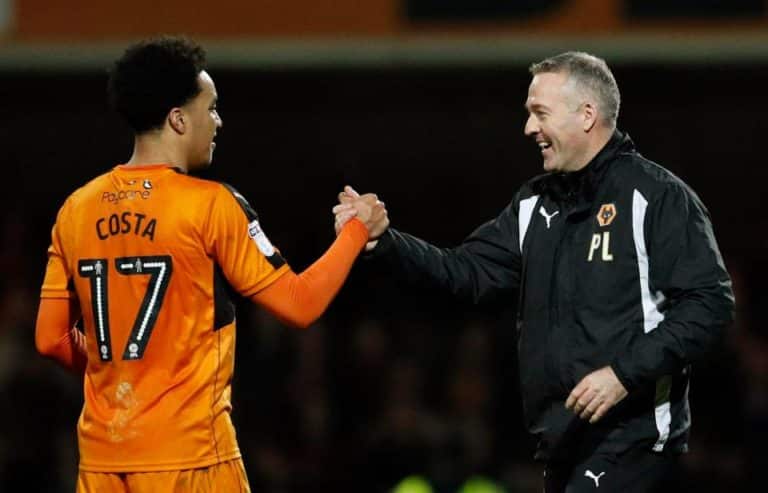 Helder Costa celebrates with Paul Lambert as Wolves get a late winner against Brentford