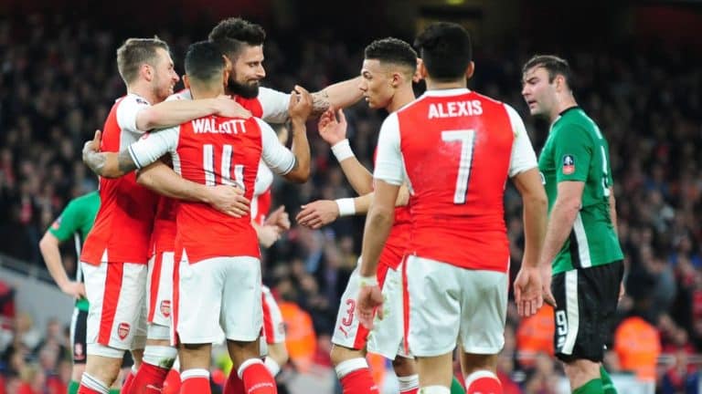 Arsenal celebrate after scoring on their way to beating Lincoln City 5-0 in the FA Cup
