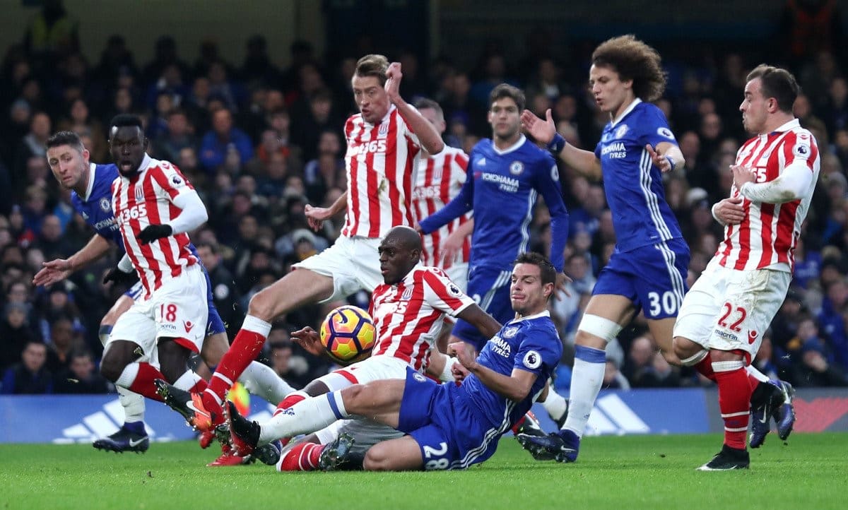 3 at the back. Azpilicueta, Cahill and David Luiz in action for Chelsea against Stoke in the Premier League