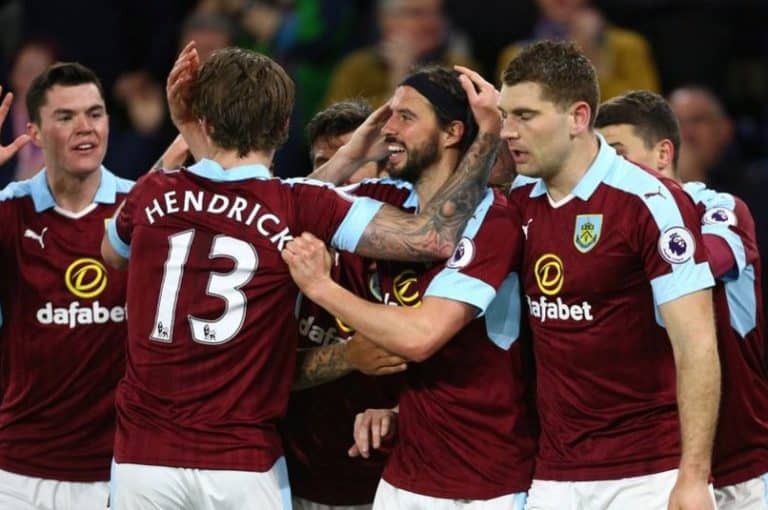 George Boyd celebrates with his Burnley teammates after scoring against Stoke