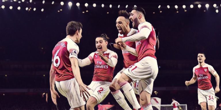 Arsenal celebrate Koscielny's goal against Chelsea