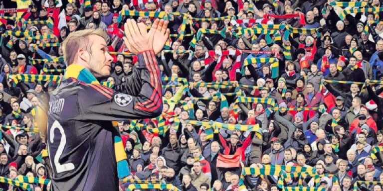 David Beckham adorns the anti-Glazer Green and Gold scarf as he returns to Old Trafford with AC Milan for a Champions League game against Manchester United in 2010