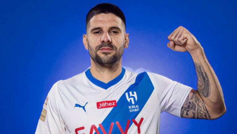 Aleksandar Mitrovic poses after completing his transfer from Fulham to Al-Hilal.