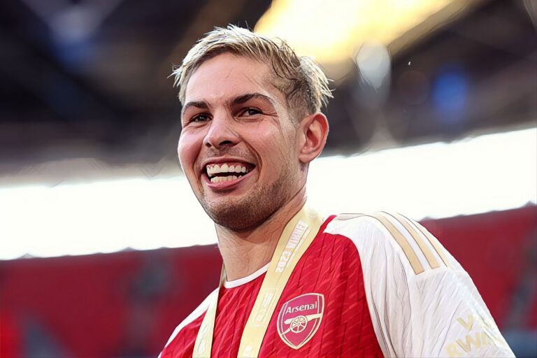 Emile Smith Rowe of Arsenal looks on with his FA Community Shield medal following the team's victory over Man City.