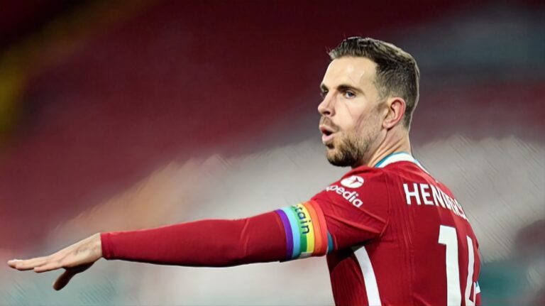 Former Liverpool captain Jordan Henderson wearing the rainbow armband in support of the LGBTQ+ community.