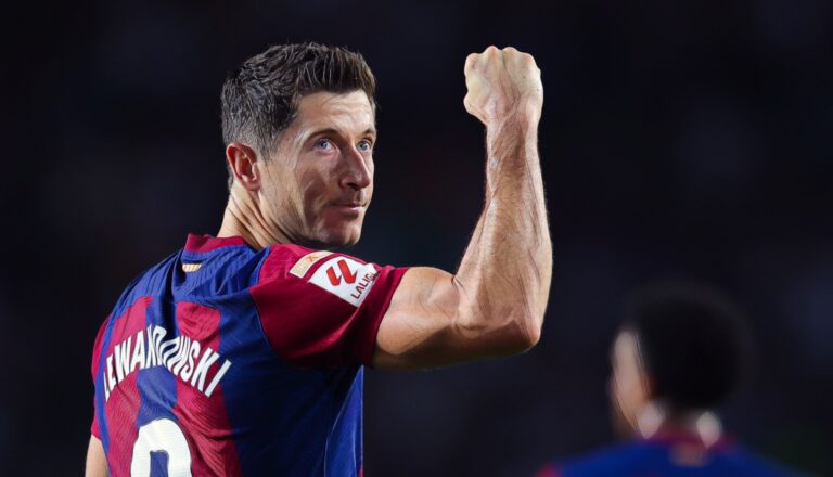 Robert Lewandowski of Barcelona celebrates after scoring the team's second goal during the LaLiga EA Sports match between FC Barcelona and Real Betis at Estadi Olimpic Lluis Companys on September 16, 2023