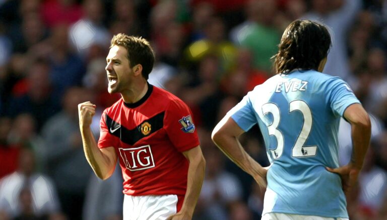 Michael Owen of Manchester United celebrates scoring the winning goal in injury time during the Barclays Premier League match between Man Utd and Man City at Old Trafford on September 20, 2009.