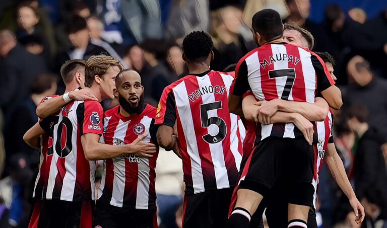 Brentford players Bryan Mbeumo, Ethan Pinnock and Neal Maupay celebrate with teammates after scoring the team's second goal during the Premier League match between Chelsea FC and Brentford FC at Stamford Bridge on October 28, 2023 in London, England. (Photo by Alex Broadway/Getty Images)