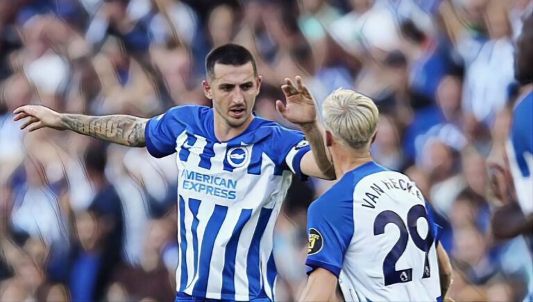 Lewis Dunk of Brighton & Hove Albion celebrates with teammate Jan Paul van Hecke after scoring the team's second goal during the Premier League match between Brighton & Hove Albion and Liverpool FC at American Express Community Stadium on October 08, 2023