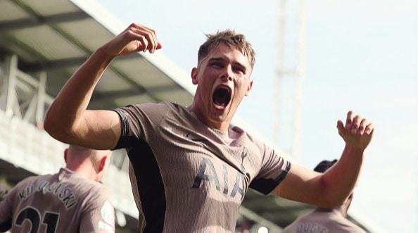 Micky van de Ven of Tottenham Hotspur celebrates after scoring the team's first goal during the Premier League match between Luton Town and Spurs at Kenilworth Road on October 07, 2023