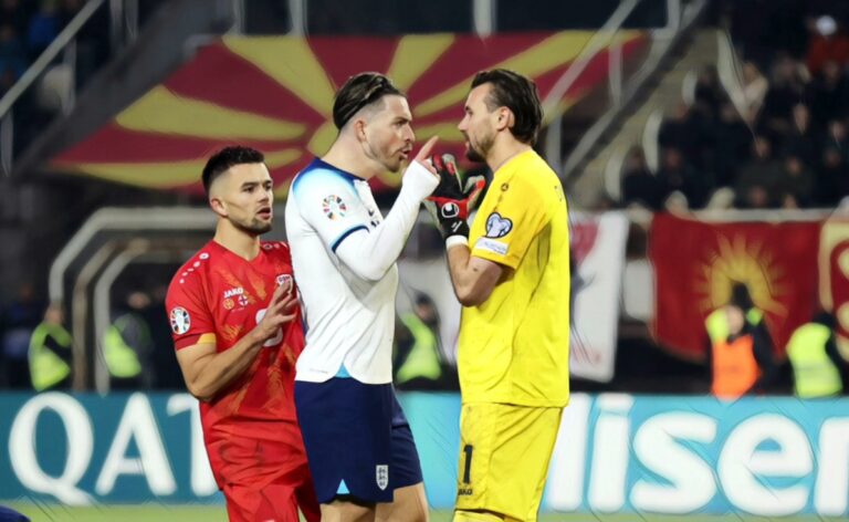 Jack Grealish clashes with Stole Dimitrievski of North Macedonia during the UEFA EURO 2024 European qualifier match between North Macedonia and England at National Arena Todor Proeski on November 20, 2023 in Skopje, Macedonia.