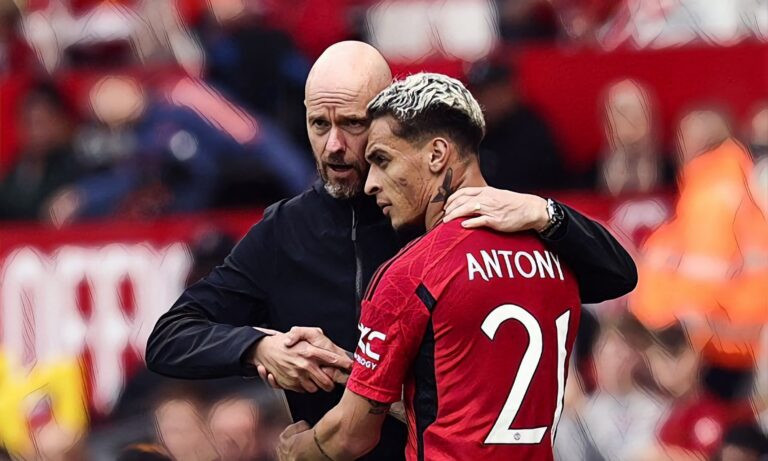 Manchester United's Brazilian midfielder Antony (R) is congratulated by Manchester United's Dutch manager Erik ten Hag (L) as he leaves the pitch during the pre-season friendly football match between Man Utd and Lens at Old Trafford stadium, in Manchester, on August 5, 2023.