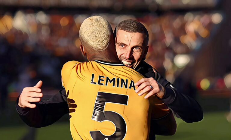 Mario Lemina of Wolverhampton Wanderers celebrates with Manager Gary O'Neil after the team's victory in the Premier League match between Wolverhampton Wanderers and Tottenham Hotspur at Molineux on November 11, 2023.