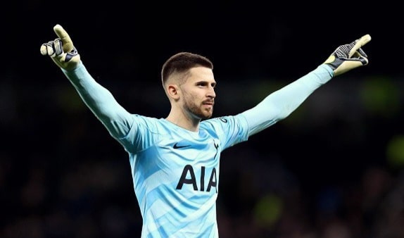 Guglielmo Vicario of Tottenham celebrates after the team's victory in the Premier League match between Spurs and Everton FC at Tottenham Hotspur Stadium on December 23, 2023
