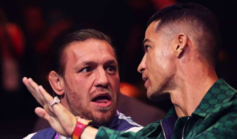 Conor McGregor, Irish Mixed Martial Artist and Boxer, and Cristiano Ronaldo, Portuguese football player of Al Nassr, interact during the Day of Reckoning: Fight Night at Kingdom Arena on December 23, 2023 in Riyadh, Saudi Arabia.