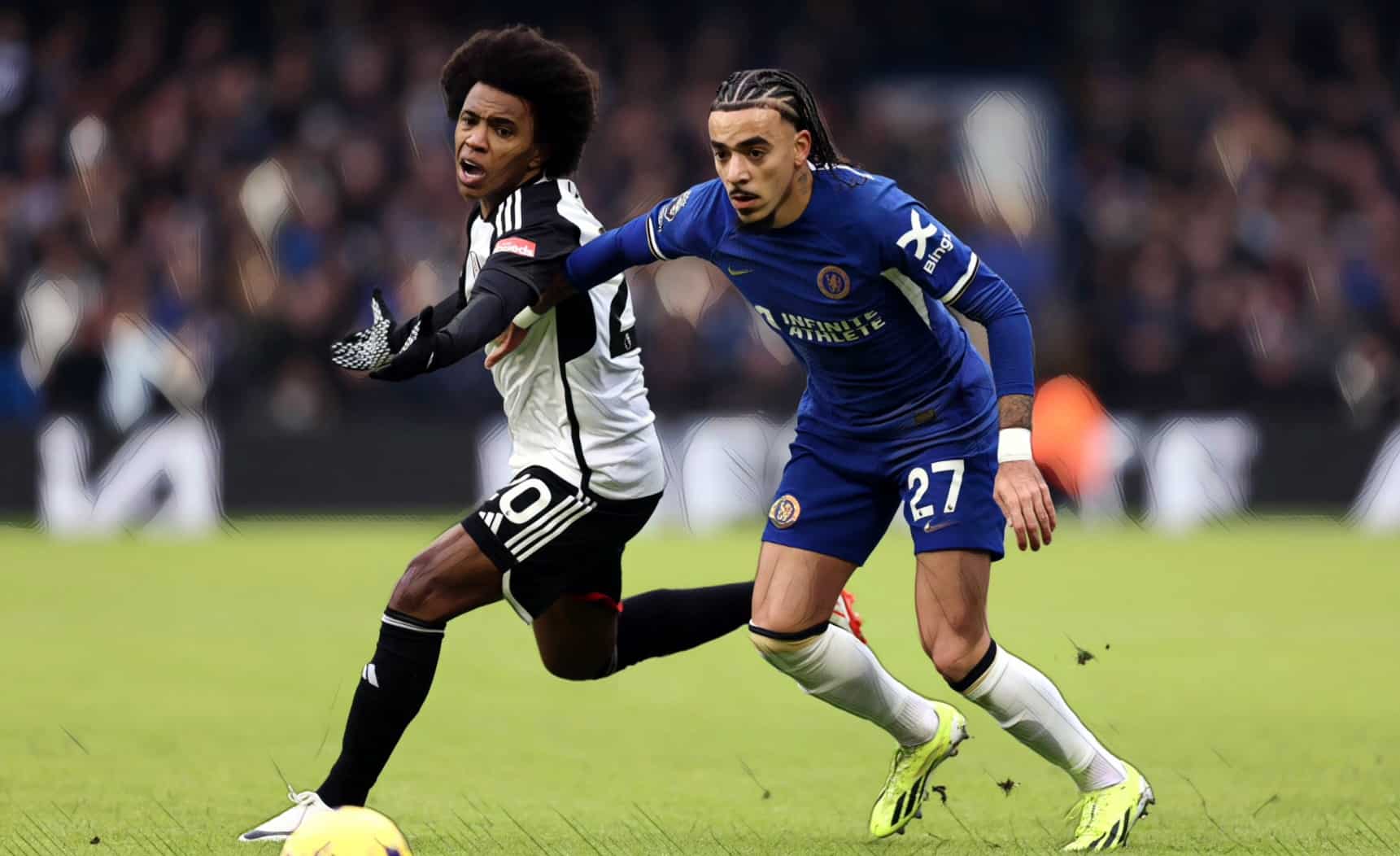 Willian of Fulham and Malo Gusto of Chelsea during the Premier League match between Chelsea FC and Fulham FC at Stamford Bridge on January 13, 2024.