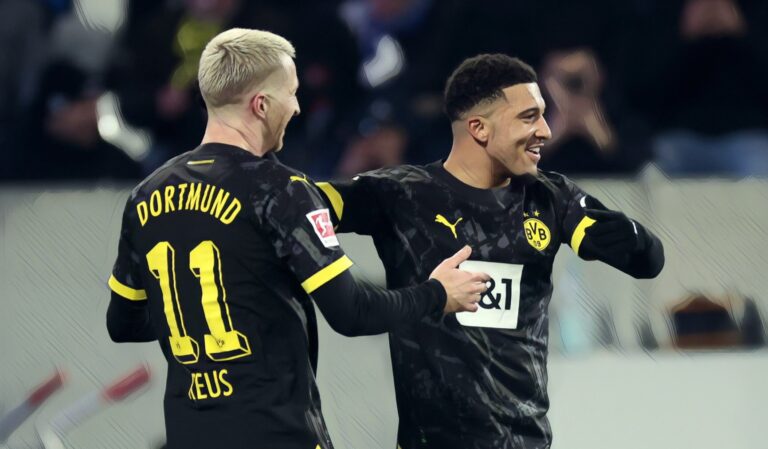 Marco Reus celebrates scoring his team's second goal with teammate Jadon Sancho during the Bundesliga match between SV Darmstadt 98 and Borussia Dortmund at Merck-Stadion am Böllenfalltor on January 13, 2024.