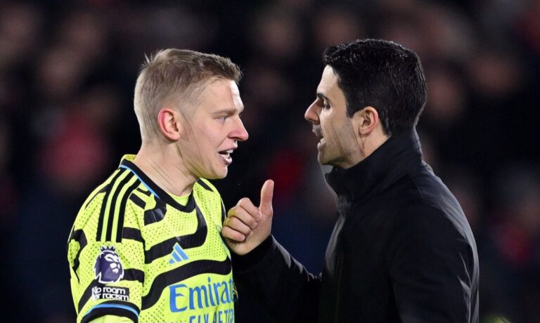 Oleksandr Zinchenko and Mikel Arteta, Manager of Arsenal, interact after the team's victory in the Premier League match between Nottingham Forest and Arsenal FC at City Ground on January 30, 2024 in Nottingham, England. (Photo by Michael Regan/Getty Images)