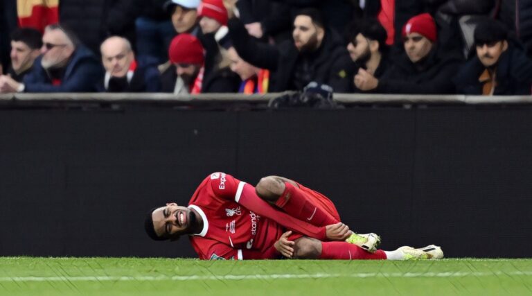Ryan Gravenberch of Liverpool goes down with an injury after a tackle from Moises Caicedo of Chelsea (not pictured) during the Carabao Cup Final match between Chelsea and Liverpool at Wembley Stadium on February 25, 2024 in London, England. (Photo by Mike Hewitt/Getty Images)
