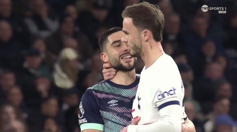 Spurs midfielder James Maddison confronts Brentford forward Neal Maupay.