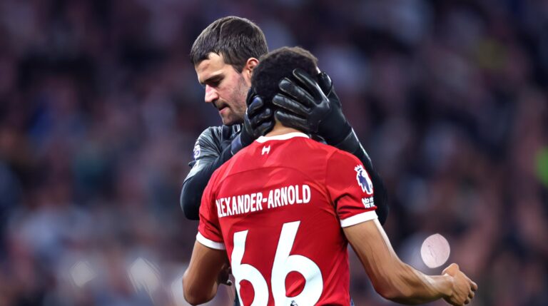 Liverpool goalkeeper Alisson Becker pats Trent Alexander-Arnold's head after Tottenham go 2-1 up during the Premier League match between Tottenham Hotspur and Liverpool FC on September 30, 2023.