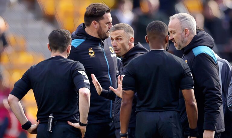 Wolves boss Gary O'Neil remonstrates with Referee Tony Harrington at full-time after his team's second goal scored by Max Kilman (not pictured) is ruled out due to an offside on Tawanda Chirewa (not pictured) in the Premier League match between Wolverhampton Wanderers and West Ham United at Molineux on April 06, 2024 in Wolverhampton, England