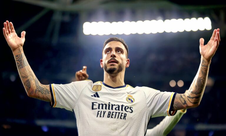 Joselu of Real Madrid celebrates after scoring the team's fourth goal during the UEFA Champions League match between Real Madrid and SSC Napoli at Estadio Santiago Bernabeu on November 29, 2023 in Madrid, Spain.