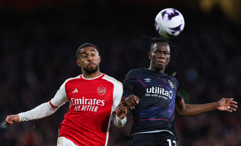 Arsenal midfielder 24 Reiss Nelson (L) and Luton Town's Burkinese defender #12 Issa Kabore (R) eye th during the English Premier League football match between Arsenal and Luton Town at the Emirates Stadium in London on April 3, 2024.