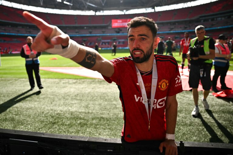 Manchester United's Portuguese midfielder #08 Bruno Fernandes celebrates after winning at the end of the English FA Cup final football match between Manchester City and Manchester United at Wembley stadium, in London, on May 25, 2024. Man Utd wins 2-1 against Manchester City.