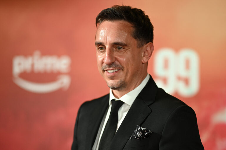 Former Man Utd footballer Gary Neville poses on the red carpet upon arrival to attend the world premiere of the documentary '99', in Manchester, northern England on May 9, 2024.