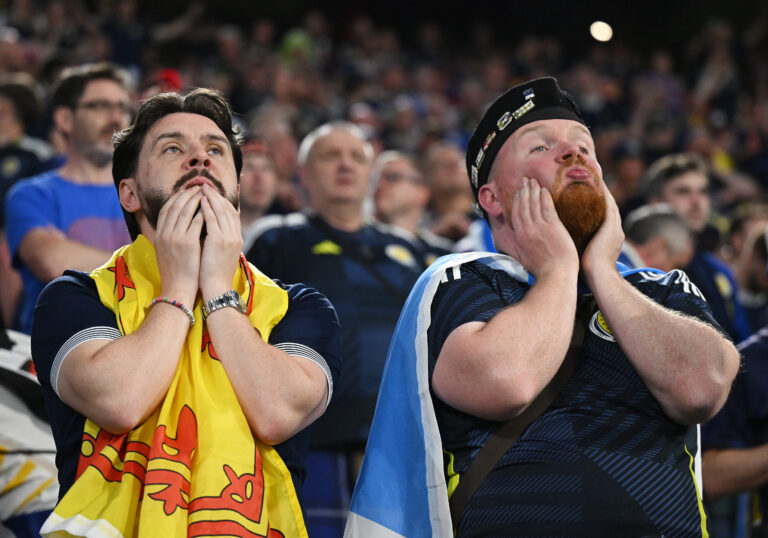 Scotland fans look dejected during the UEFA EURO 2024 group stage match between Germany and Scotland at Munich Football Arena on June 14, 2024 in Munich, Germany.