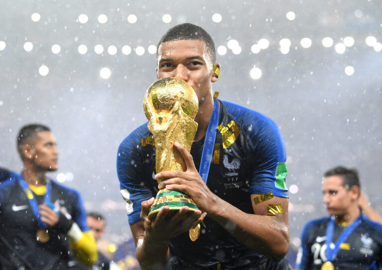 Kylian Mbappe of France celebrates with the World Cup Trophy following his sides victory in the 2018 FIFA World Cup Final between France and Croatia at Luzhniki Stadium on July 15, 2018 in Moscow, Russia.