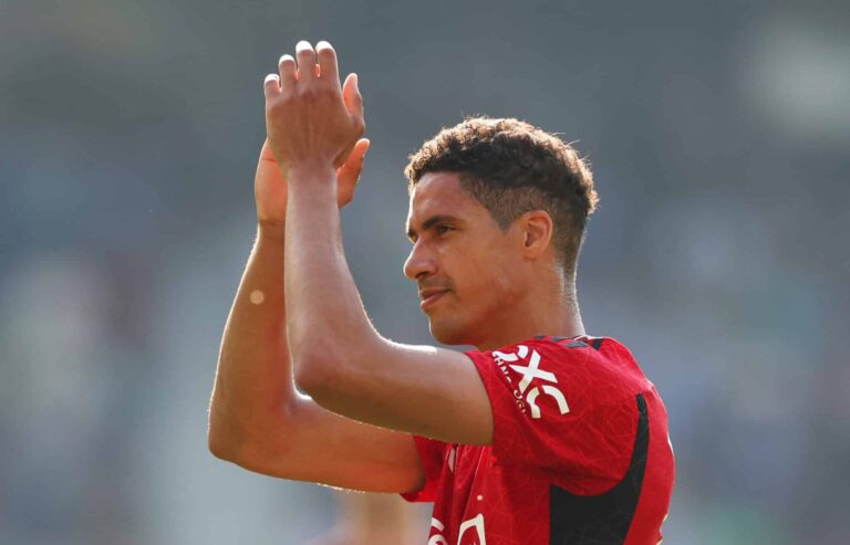 Raphael Varane of Manchester United applauds the fans after the team's victory in the Premier League match between Brighton & Hove Albion and Manchester United at American Express Community Stadium on May 19, 2024 in Brighton, England.
