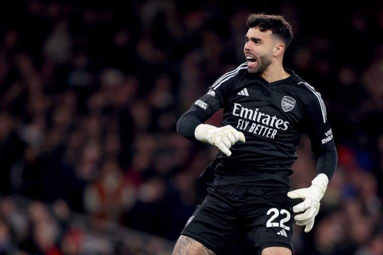 David Raya celebrates after Ben White of Arsenal scored his team's second goal during the Premier League match between Arsenal FC and Chelsea FC at Emirates Stadium on April 23, 2024 in London, England.