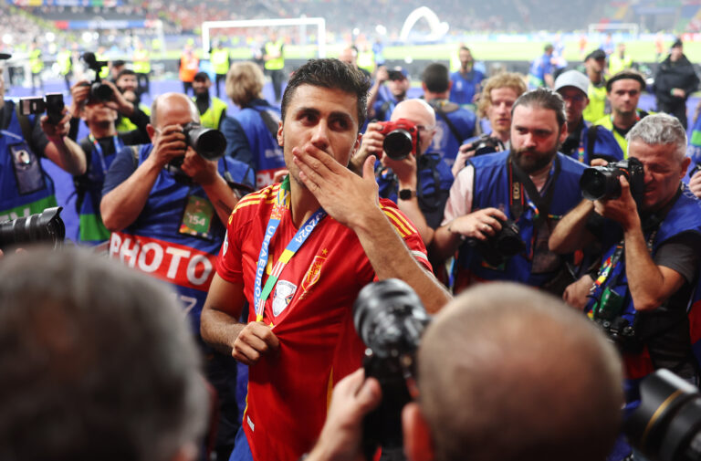 Premier League star Rodri acknowledges the fans as he celebrates victory after the UEFA EURO 2024 final match between Spain and England at Olympiastadion on July 14, 2024 in Berlin, Germany.