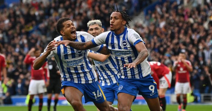 Brighton's Brazilian striker #09 Joao Pedro (R) celebrates scoring the team's second goal with Brighton's French striker #14 Georginio Rutter during the English Premier League football match between Brighton and Hove Albion and Manchester United at the American Express Community Stadium in Brighton, southern England on August 24, 2024.
