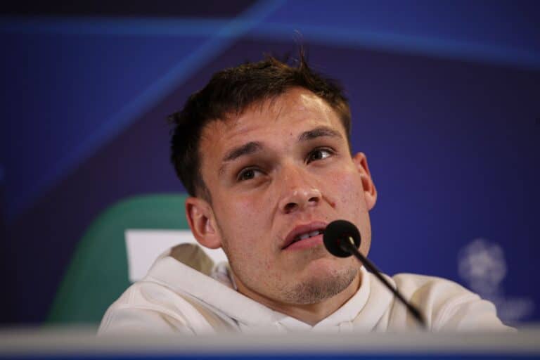 Man United transfer target Manuel Ugarte sits during a press conference.