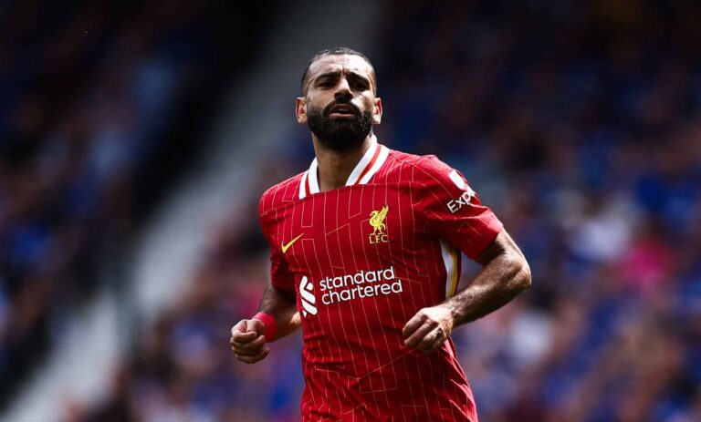 Liverpool's Egyptian striker #11 Mo Salah reacts during the English Premier League football match between Ipswich Town and Liverpool at Portman Road in Ipswich, eastern England on August 17, 2024.