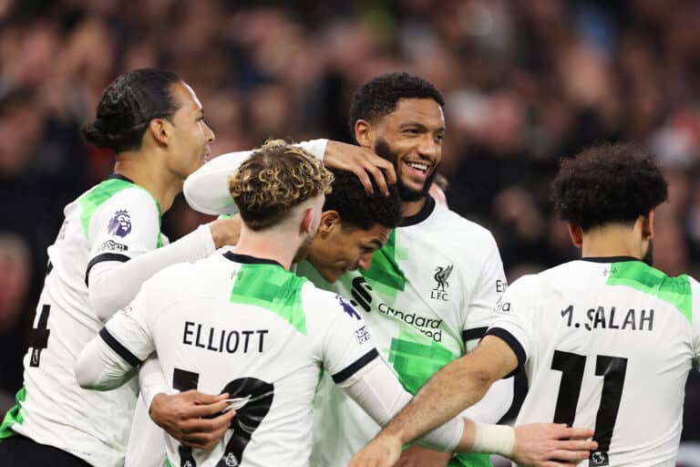 Jarell Quansah of Liverpool celebrates scoring his team's third goal with Joe Gomez and other teammates during the Premier League match between Aston Villa and Liverpool FC at Villa Park on May 13, 2024 in Birmingham, England.