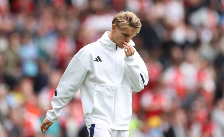 Martin Odegaard of Arsenal looks dejected following the Premier League match between Arsenal FC and Brighton &Hove Albion FC at Emirates Stadium on August 31, 2024 in London, England.