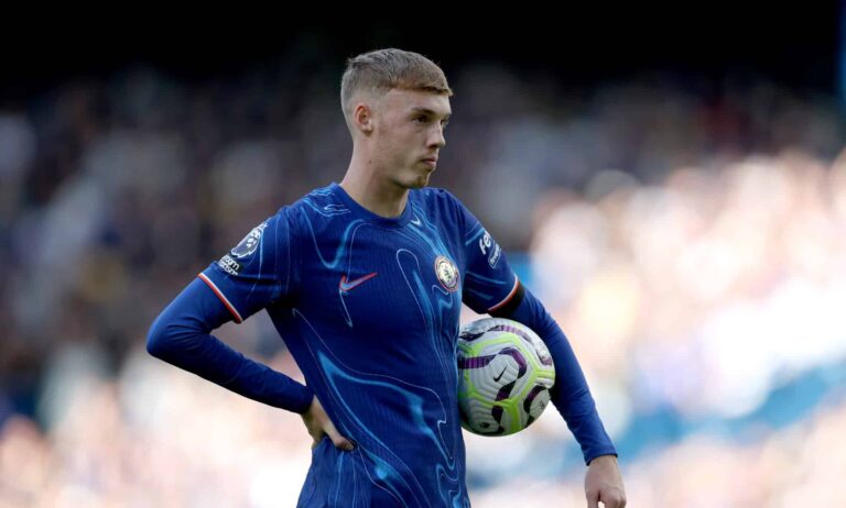 Cole Palmer of Chelsea looks on before taking his sides penalty during the Premier League match between Chelsea FC and Brighton & Hove Albion FC at Stamford Bridge on September 28, 2024 in London, England.