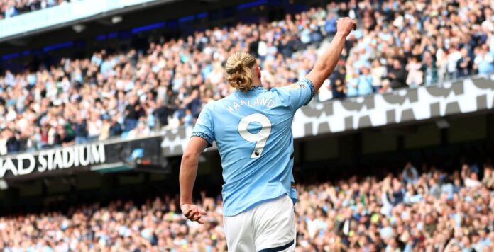Erling Haaland of Man City celebrates scoring his team's second goal during the Premier League match between Manchester City FC and Brentford FC at Etihad Stadium on September 14, 2024 in Manchester, England.