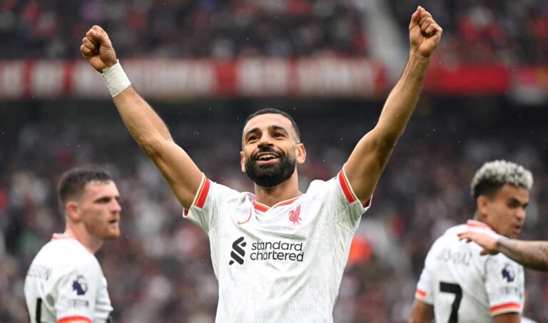 Mo Salah of Liverpool celebrates scoring his team's third goal during the Premier League match between Man United FC and Liverpool FC at Old Trafford on September 01, 2024 in Manchester, England.