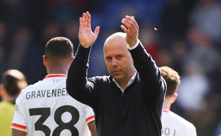 Arne Slot, Manager of Liverpool, applauds the fans following the team's victory during the Premier League match between Crystal Palace FC and Liverpool FC at Selhurst Park on October 05, 2024 in London, England.