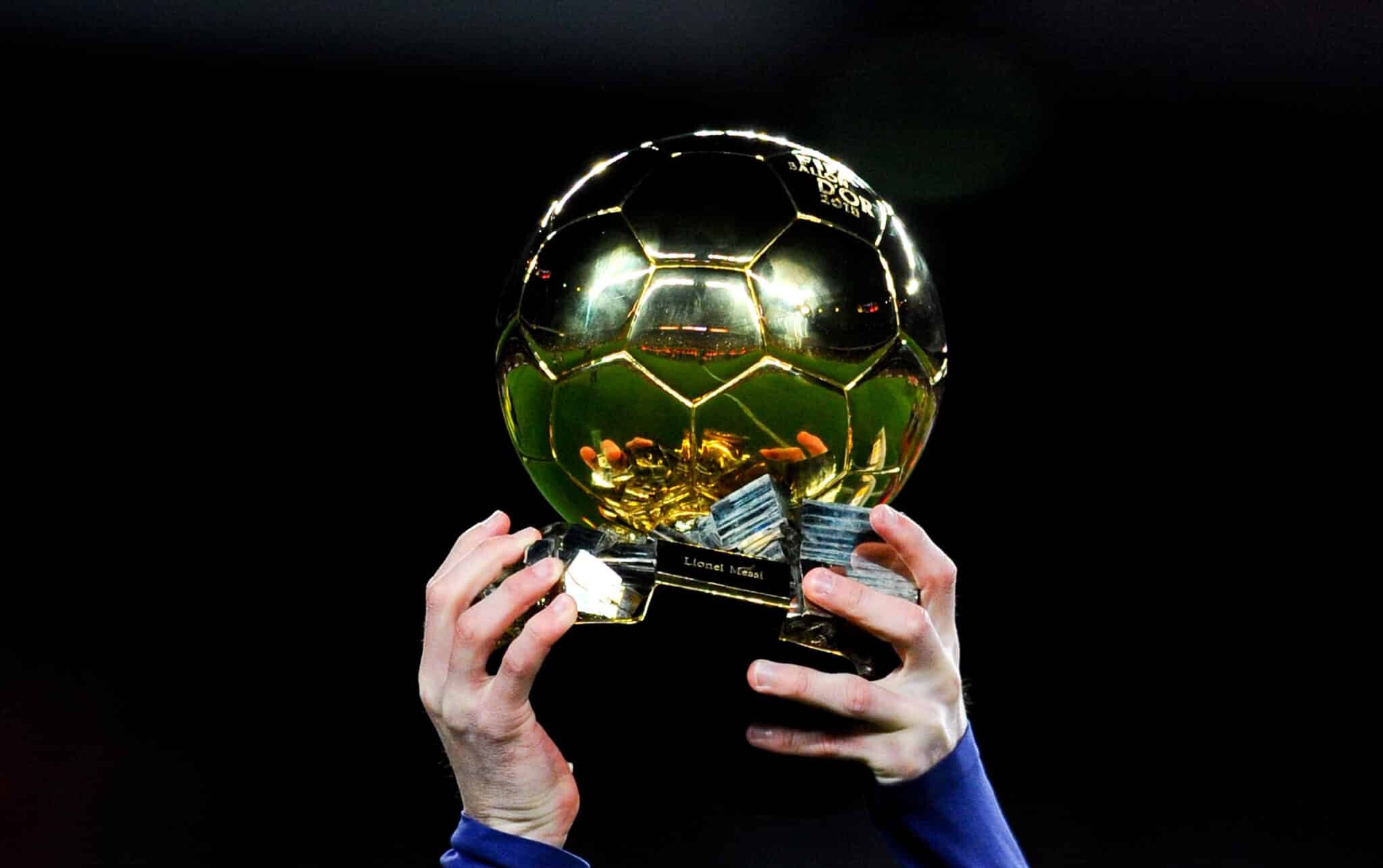 Lionel Messi of FC Barcelona holds up the Ballon d'Or award prior to the La Liga match between FC Barcelona and Athletic Club de Bilbao at Camp Nou on January 17, 2016 in Barcelona, Spain.
