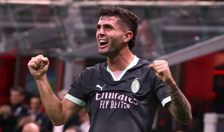 Christian Pulisic of AC Milan celebrates after scoring the opening goal during the UEFA Champions League 2024/25 League Phase MD3 match between AC Milan and Club Brugge KV at Stadio San Siro on October 22, 2024 in Milan, Italy.
