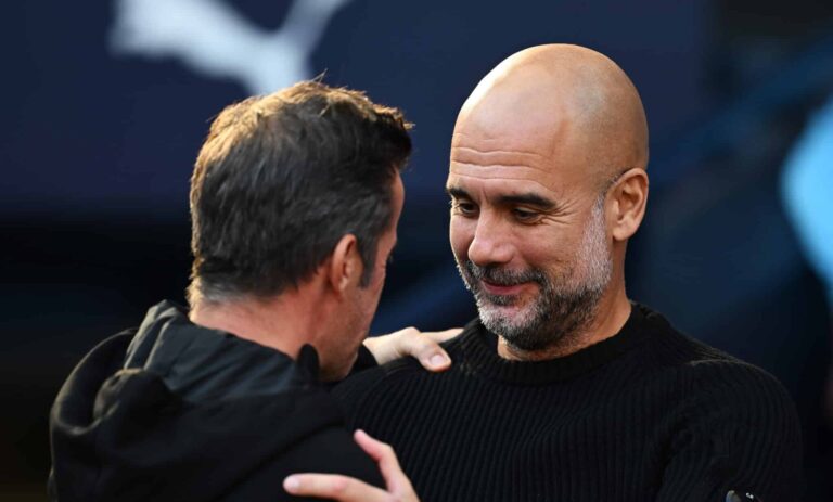 Marco Silva, Manager of Fulham, embraces with Josep Guardiola, Manager of Man City, prior to the Premier League match between Manchester City FC and Fulham FC at Etihad Stadium on October 05, 2024 in Manchester, England.