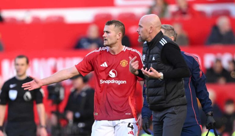 Matthijs de Ligt of Man United and Erik ten Hag, Manager of Manchester United, react following Brentford's first goal, scored by Ethan Pinnock (not pictured) as Matthijs de Ligt has received treatment on the sideline during the Premier League match between Man Utd and Brentford FC at Old Trafford on October 19, 2024 in Manchester, England.