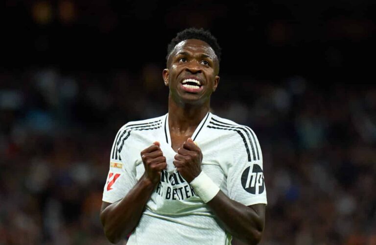 Vinicius Junior of Real Madrid reacts during the LaLiga match between Real Madrid CF and FC Barcelona at Estadio Santiago Bernabeu on October 26, 2024 in Madrid, Spain.